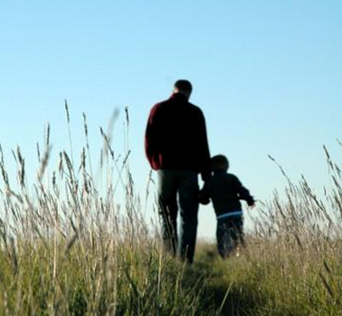 father and son walking. a father#39;s perspective.